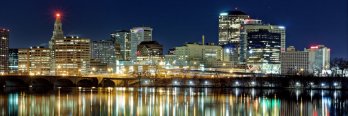 Skyline of Hartford, CT over the Connecticut River at Night.